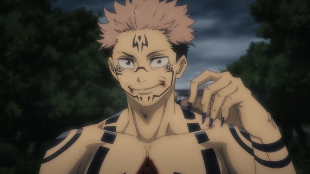 Sukuna ryomen trong jujutsu kaisen với biểu cảm nhếch mép đầy nguy hiểm và sức mạnh